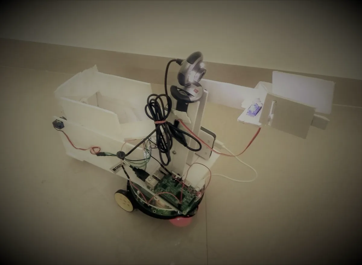 Autonomous harvesting robot built for the E-Yantra competition.